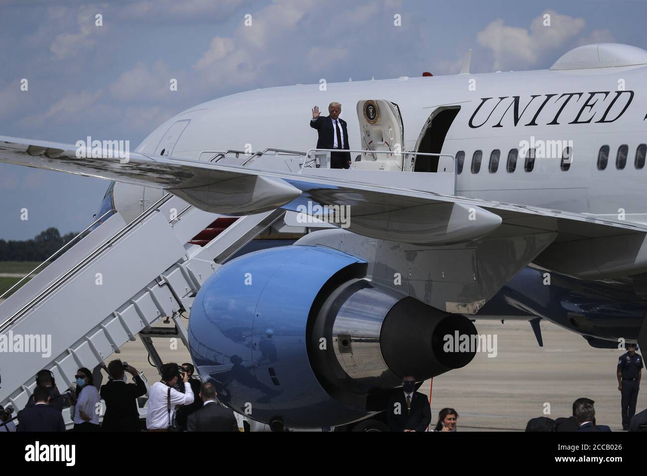 Washington, United States. 20th Aug, 2020. President Donald Trump waves as he boards Air Force One at Joint Base Andrews, Maryland on Thursday, August 20, 2020. President Trump on Wednesday urged consumers to snub Goodyear tires after the company banned employees from wearing political attire, including pro-Trump hats. Goodyear is one of two American-owed tire manufacturers. Photo by Oliver Contreras/UPI Credit: UPI/Alamy Live News Stock Photo