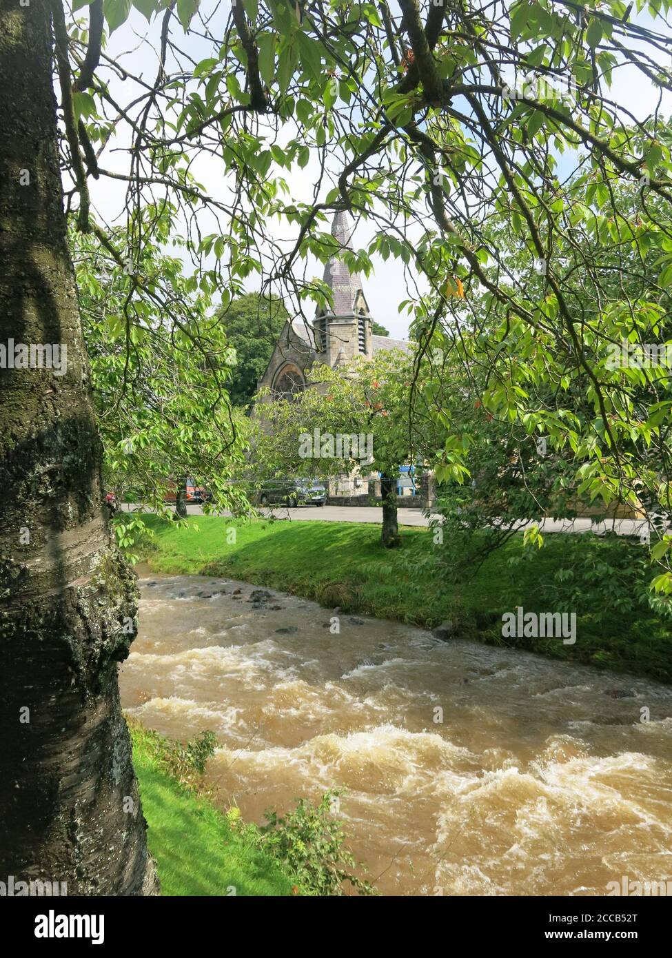 Dollar Burn flows through the town of the same name, and after heavy rainfall, there's a lot of water coming down off the Ochil Hills; August 2020 Stock Photo