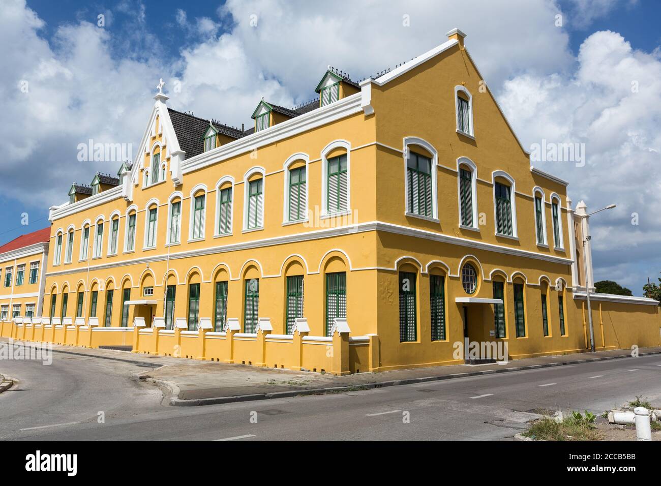 Parish Hall of the Roman Catholic Diocese of Willemstad at Julianaplein 5 in the Pietermaai district of Willemstad.  Built about 1882.   The Historic Stock Photo