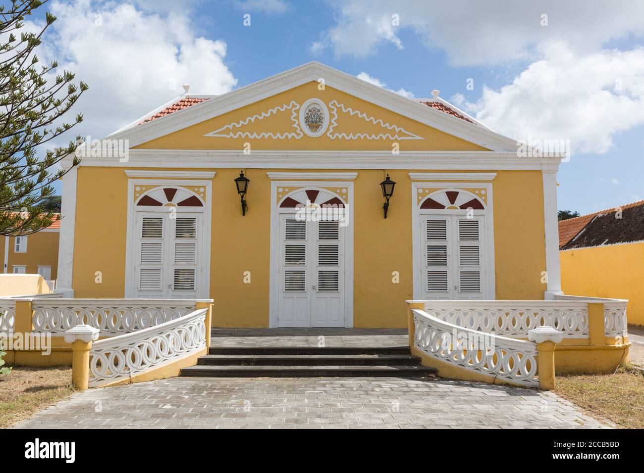 This is an historic house in the Scharloo section of the Punda District of Willemstad and was built in the late 1800's.  It now serves as government o Stock Photo