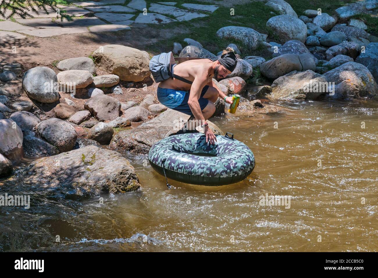 A young man near Gore Creek, The Town of Vail , Colorado, USA, North
