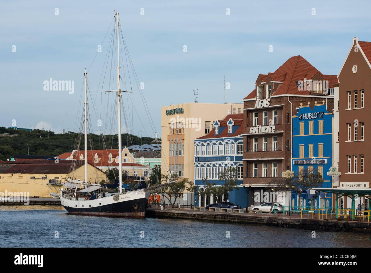 The 120-foot long Insulinde, a former sailing fishing ship built in Belgium in 1931, docked on the Punda waterfront in Willemstad, the capital of Cura Stock Photo