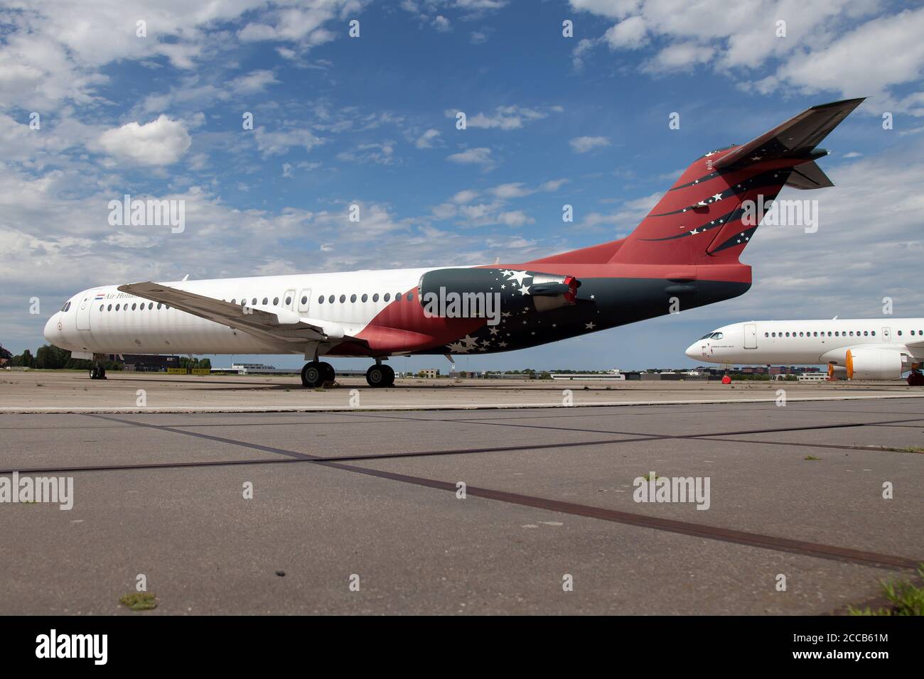 Maastricht, Netherlands. 27th July, 2020. An Air Hollandia Fokker 100 stored at Maastricht-Aachen Airport. Credit: Fabrizio Gandolfo/SOPA Images/ZUMA Wire/Alamy Live News Stock Photo