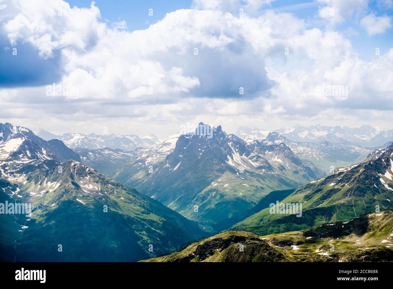 Alps Mountains. Alpine Austria Mountain With Clouds Stock Photo