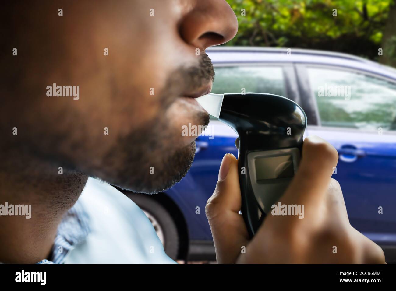 Police, alcohol testing device, breath analyzer. Traffic control, alcohol  control of car driver Stock Photo - Alamy