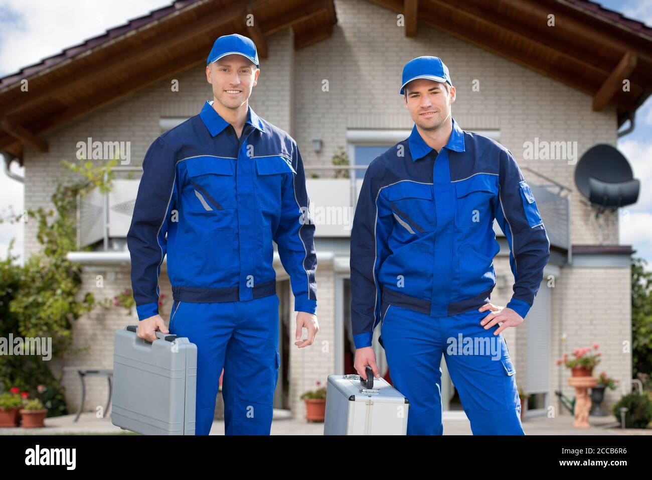 Construction Worker Tradesman And Plumber Man Service Stock Photo