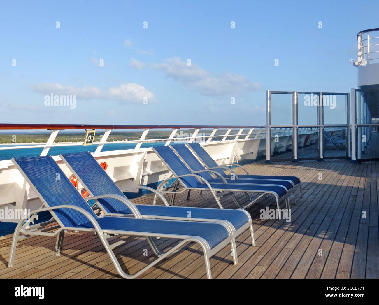 Empty deck chairs on a cruise ship Stock Photo - Alamy