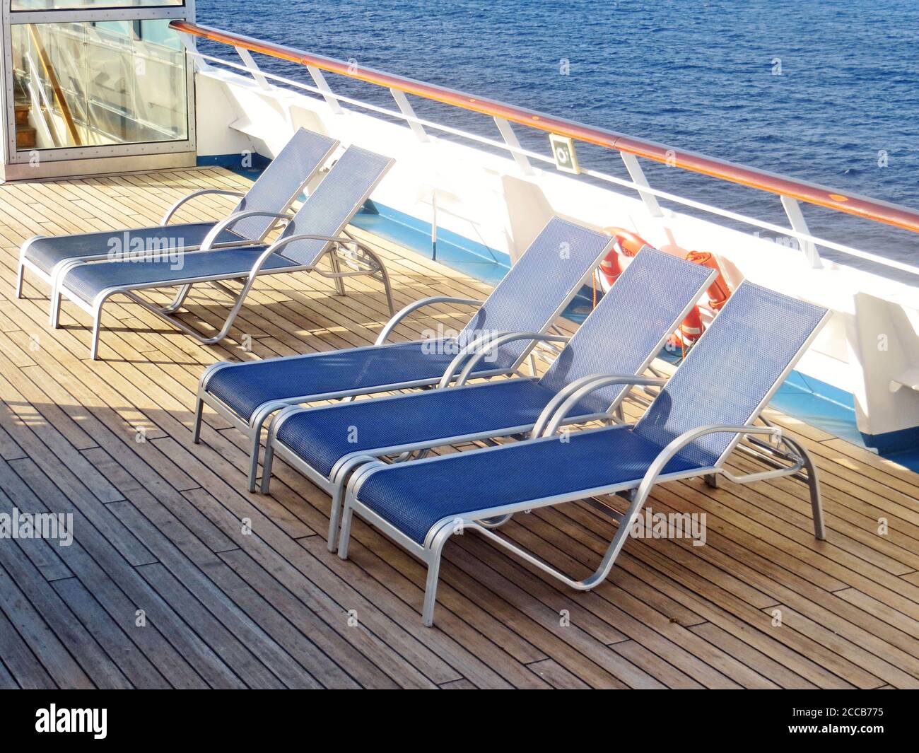 Empty deck chairs on a cruise ship Stock Photo - Alamy