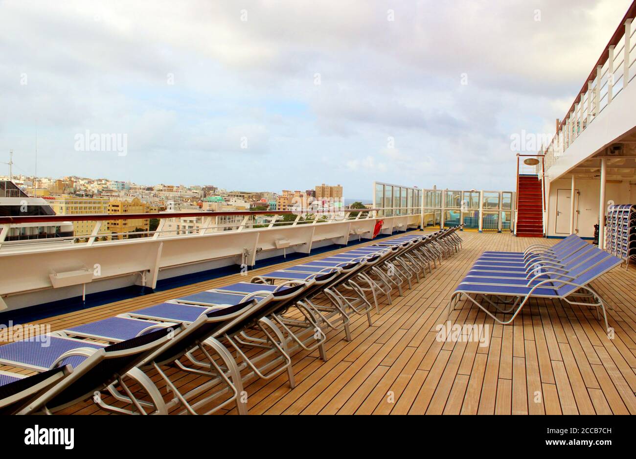 Empty deck chairs on a cruise ship Stock Photo - Alamy