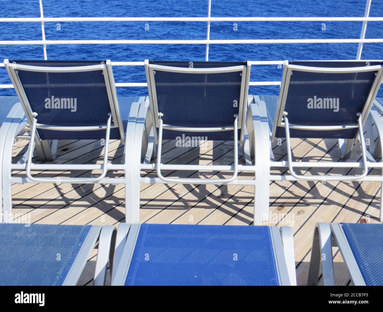 Empty deck chairs on a cruise ship Stock Photo - Alamy