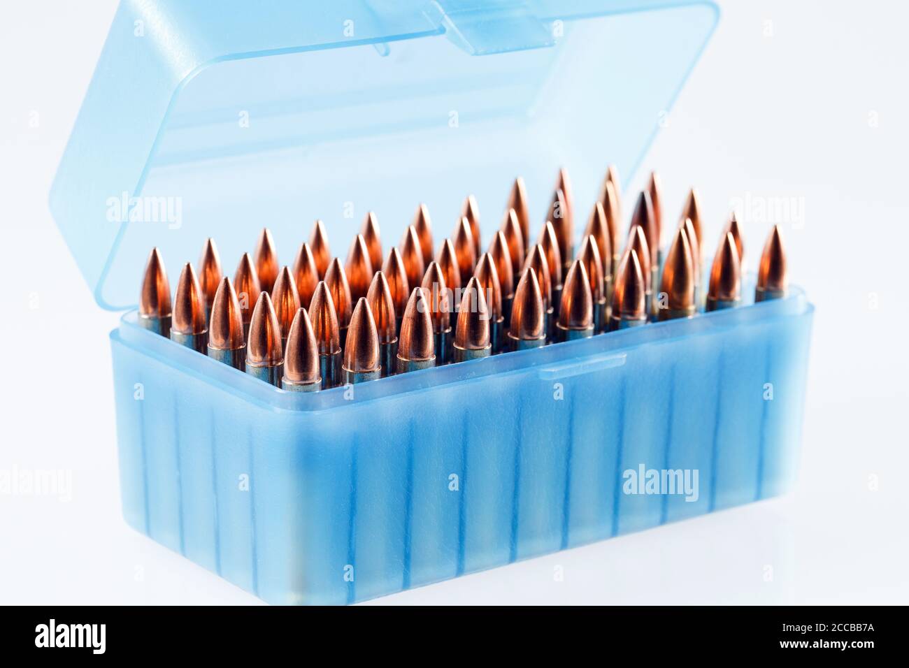 Hunting cartridges in a plastic box. Bullet storage box Stock Photo - Alamy