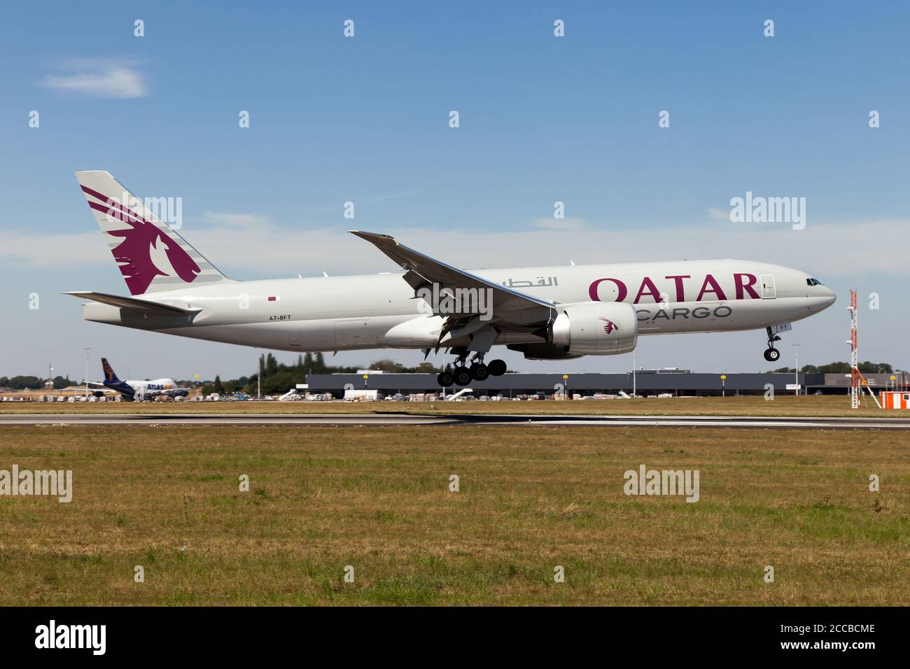 A Qatar Airways Cargo Boeing 777-FDZ  landing at Liege Bierset airport. Stock Photo