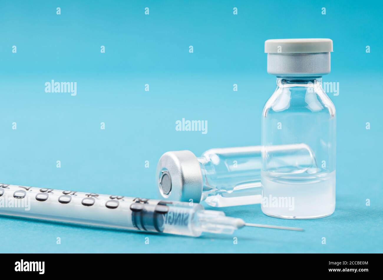 Vaccine vial dose with needle syringe, medical concept vaccination in ...