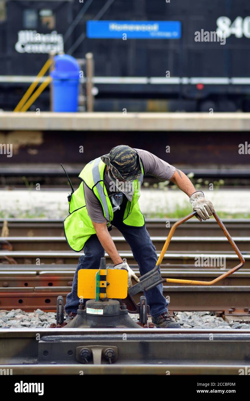 Homewood Illinois Usa A Railroad Yard Worker Manually Throws A Switch On A Lead Track To Allow A Locomotive To Be Routed From One Track To Another Stock Photo Alamy