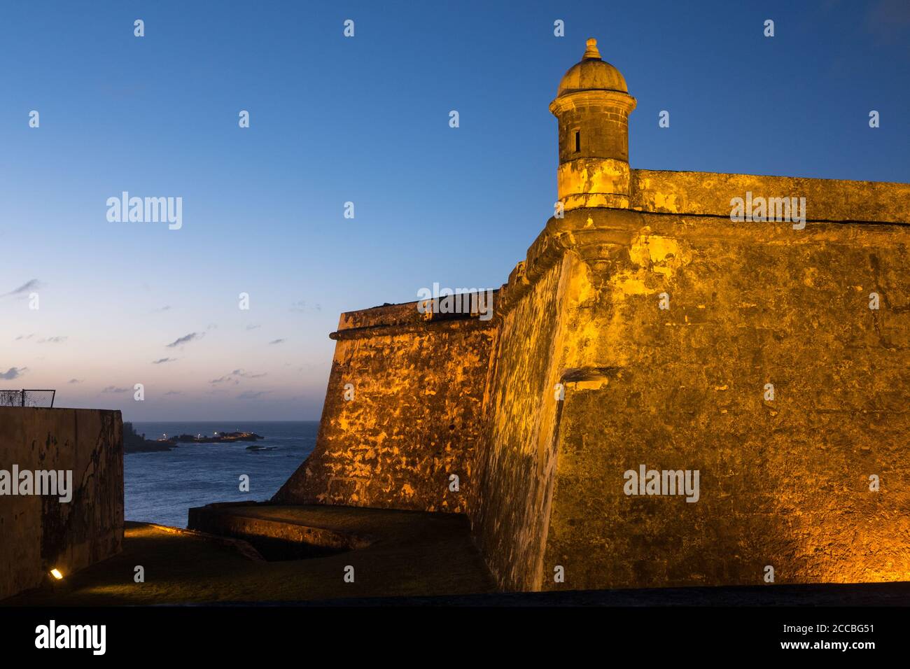 A bartizan, or guerite or sentry box on the wall of Castillo San Felipe del Morro in Old San Juan, Puerto Rico, at evening twilight.  National Registe Stock Photo