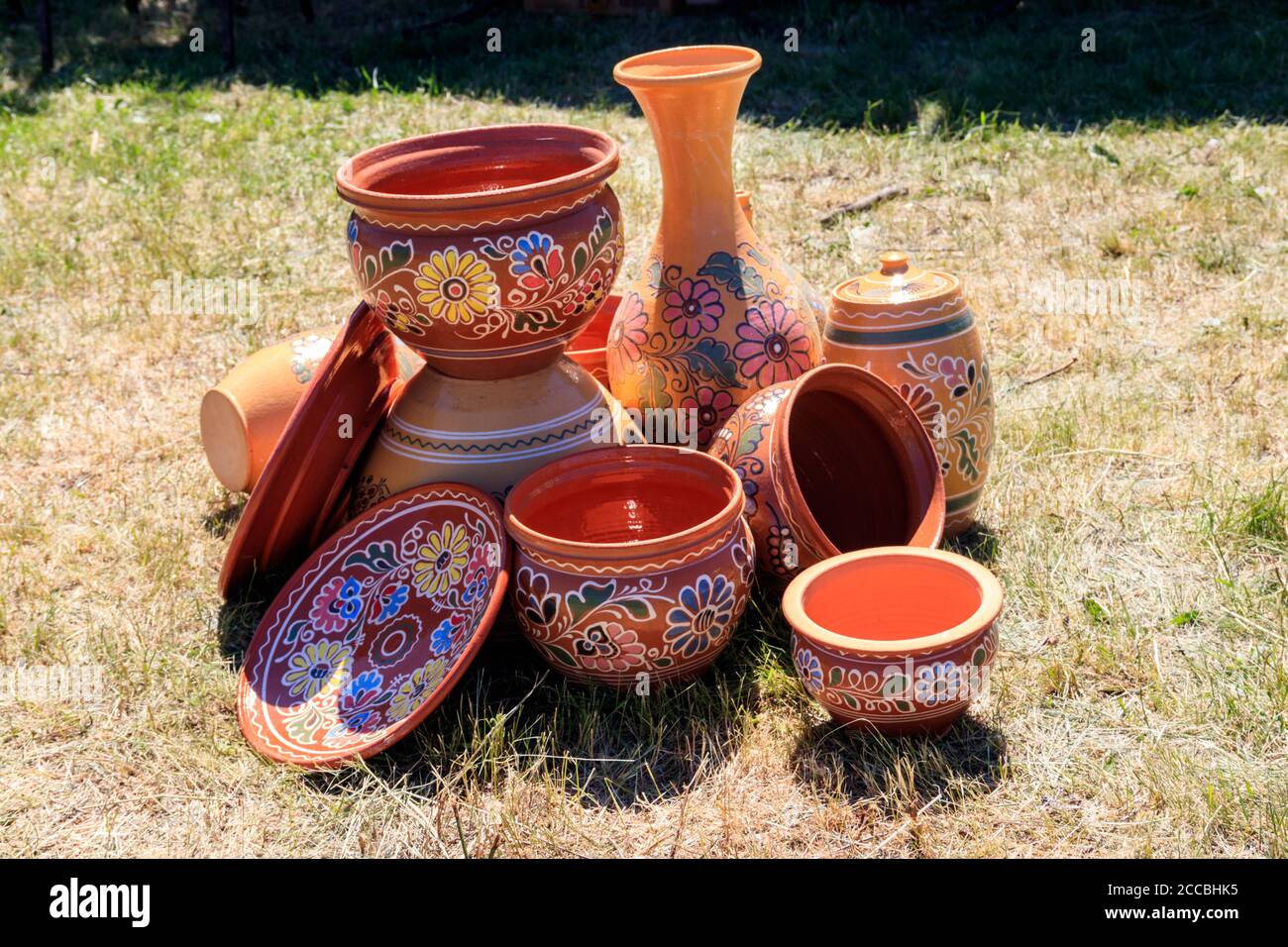 Clay pottery on green grass Stock Photo