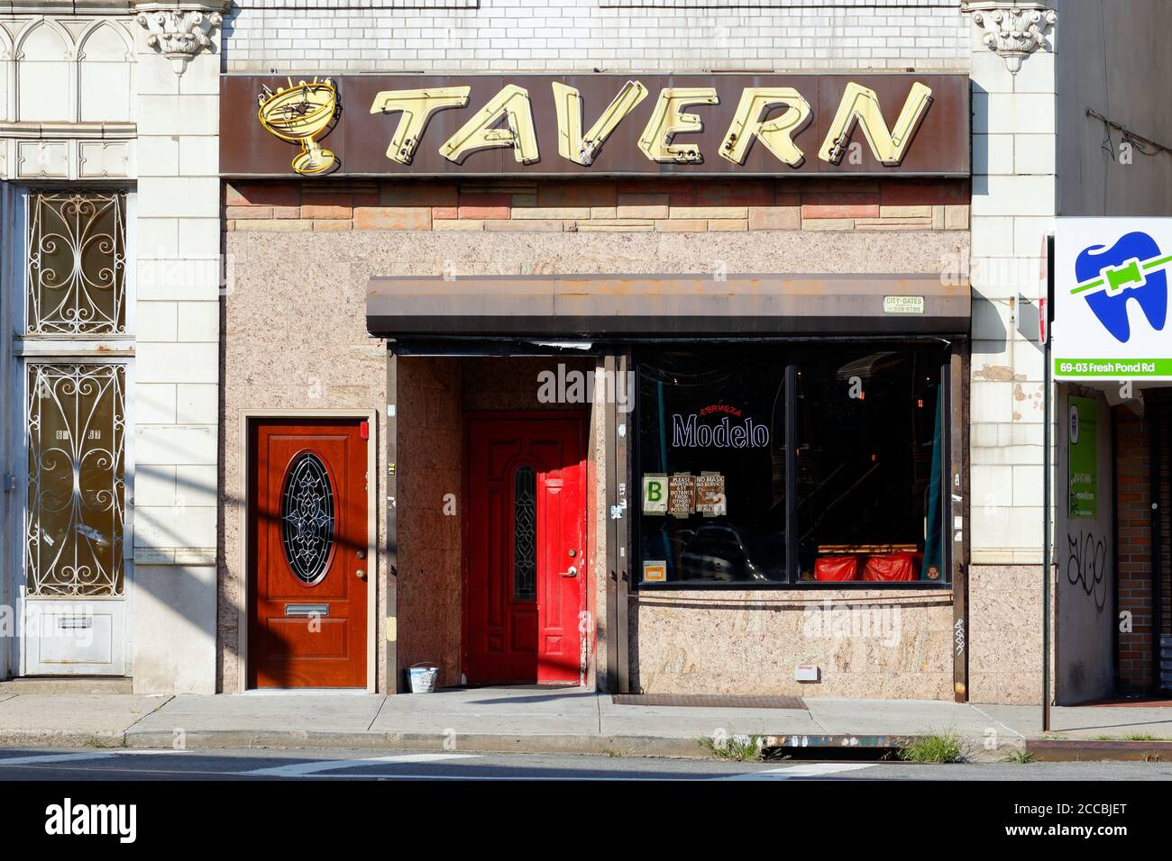 Queens Tavern, 68-69 Fresh Pond Rd, Queens, New York. NYC storefront photo of a neighborhood bar in the Ridgewood neighborhood. Stock Photo
