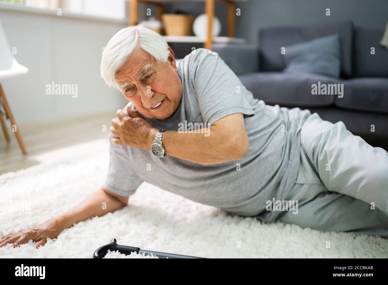 Elderly Senior Man Slip And Fall. Fallen Old Person Stock Photo