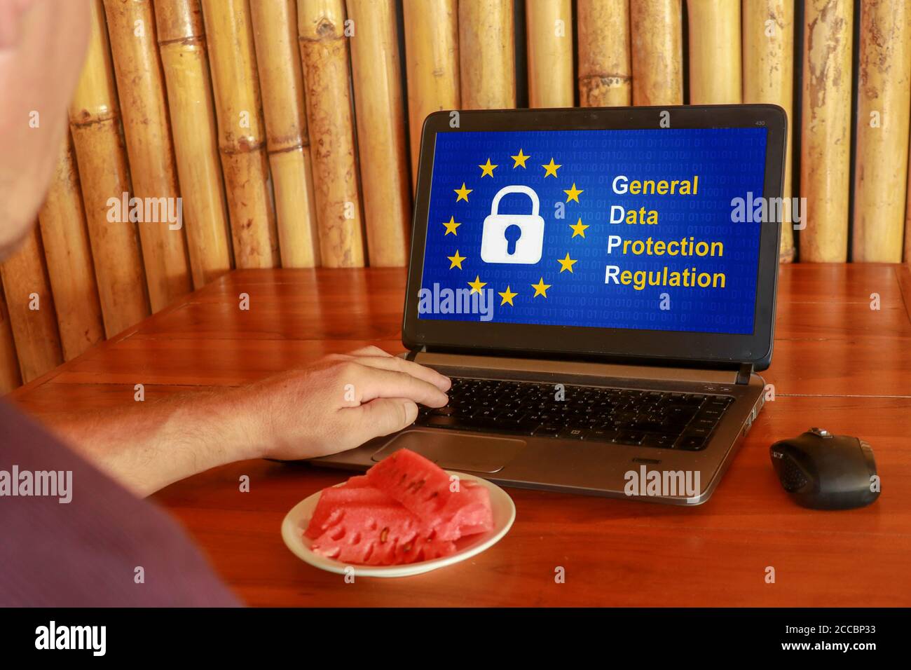 people using computer laptop with text GDPR or General Data Protection