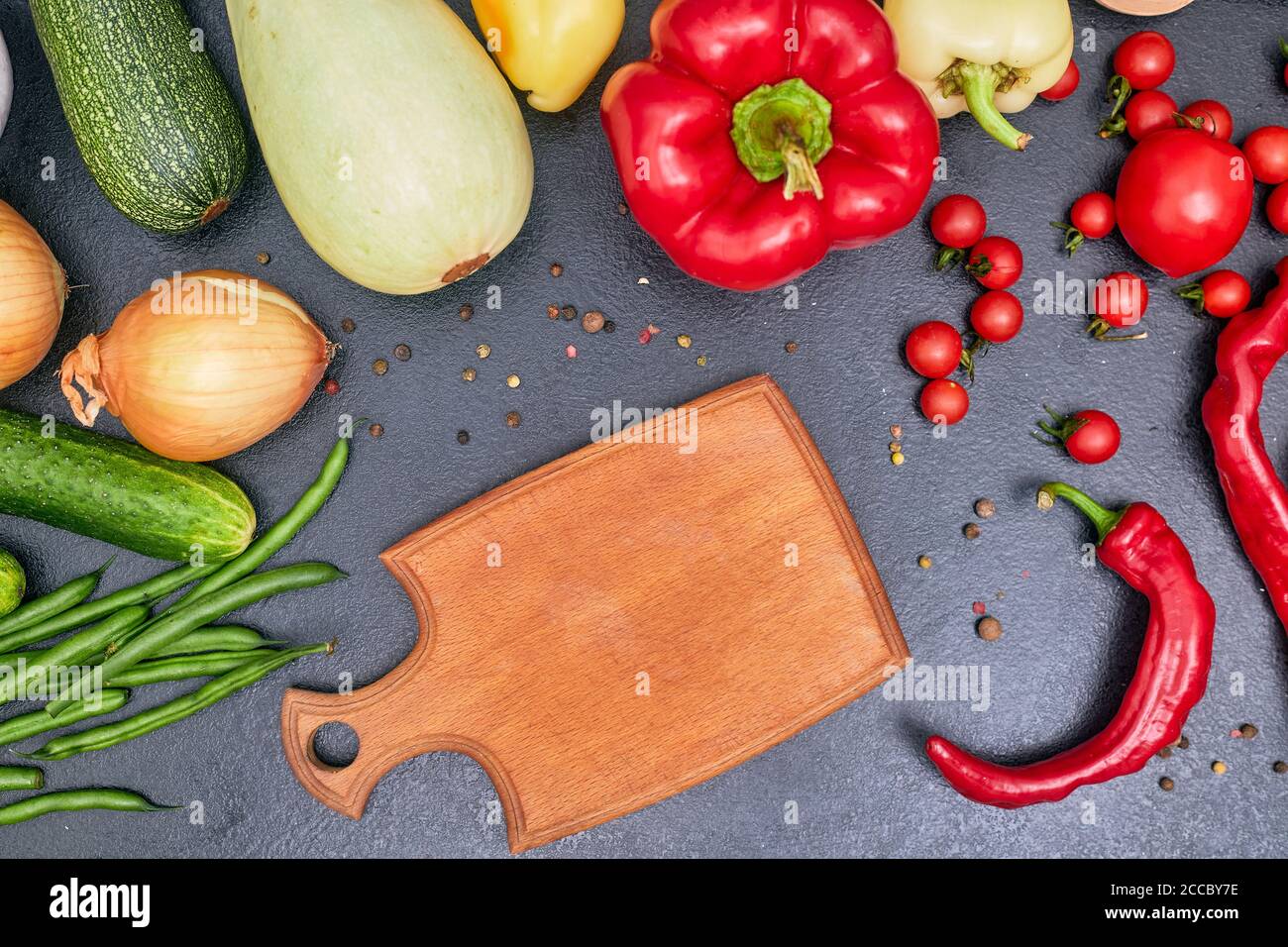 Download Wooden Board With Vegetables Mockup Copy Space Flatlay Stock Photo Alamy