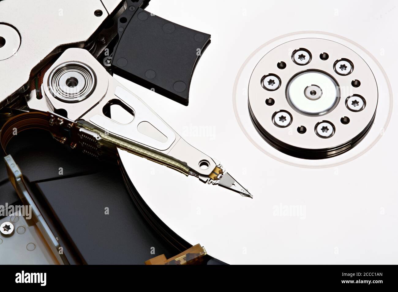 Hard disk drive inside. Data safety concept. Stacked photo. Stock Photo