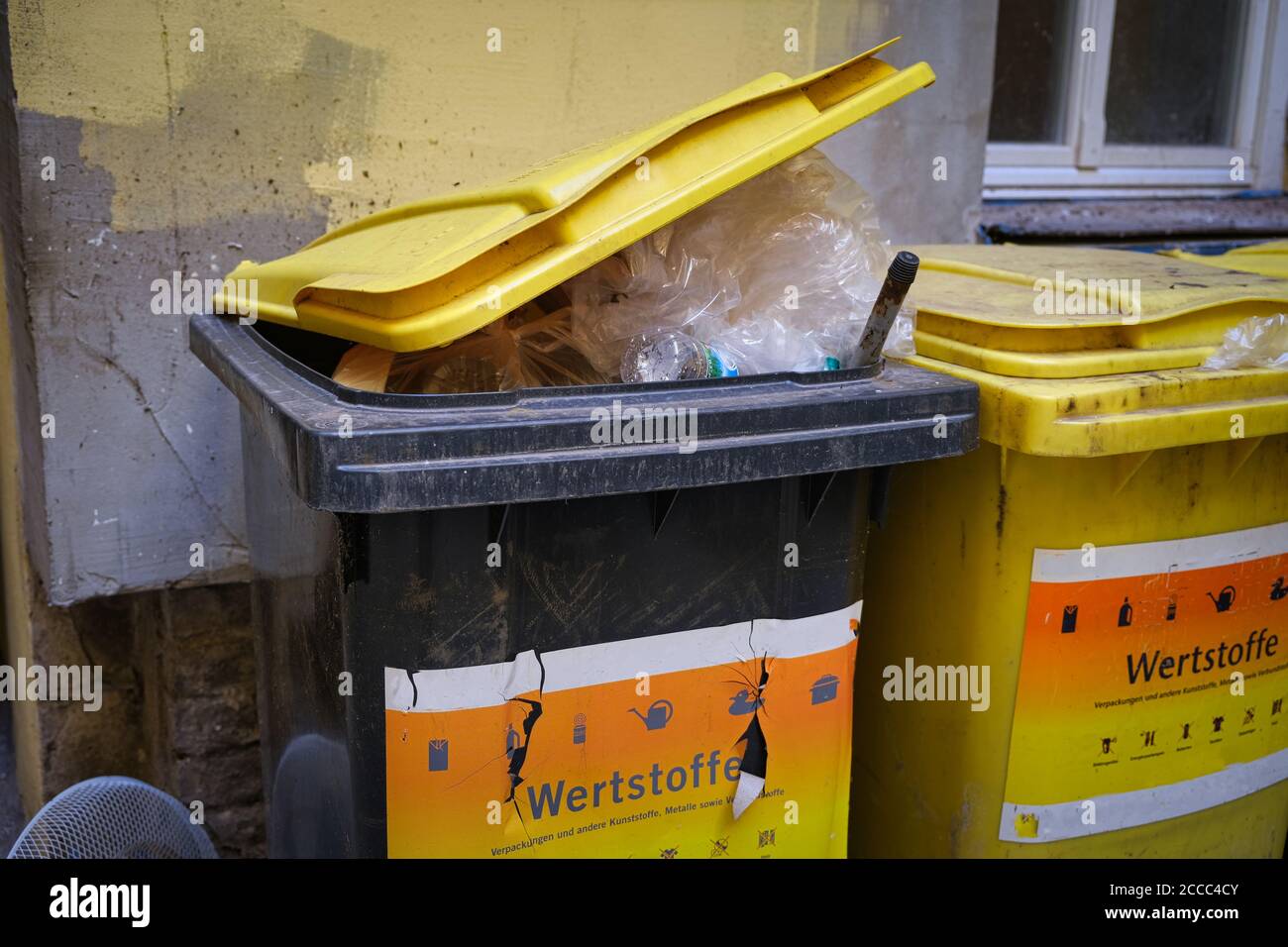 Rubbish bins for plastic and e-waste recycling in Berlin Stock Photo - Alamy