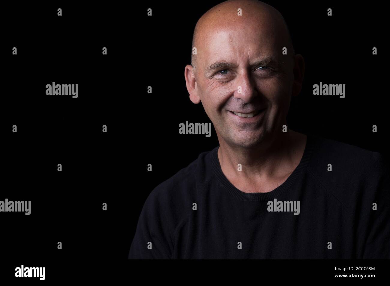a male self portrait with black background Stock Photo Alamy
