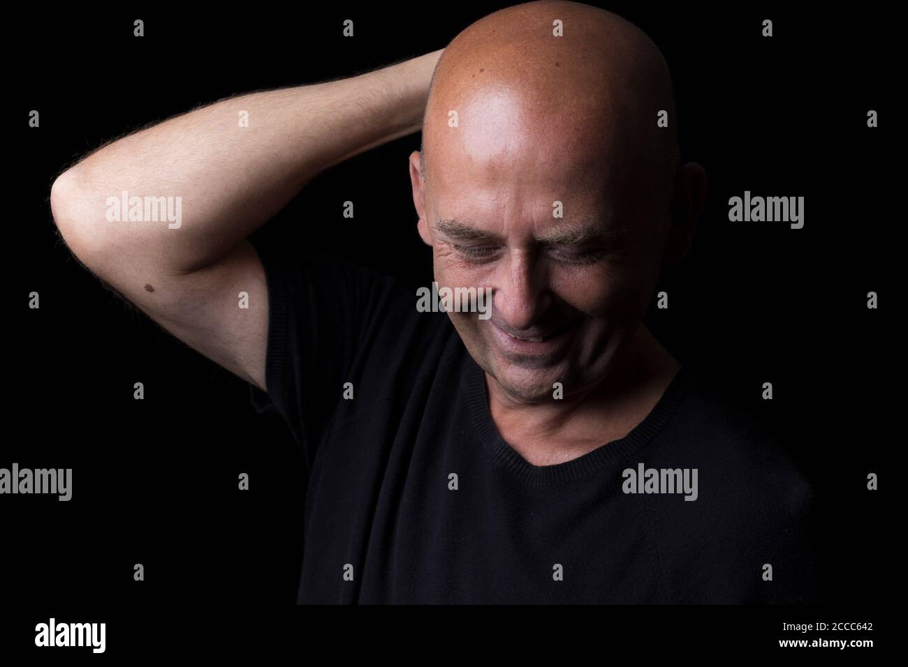 a male self portrait with black background Stock Photo Alamy