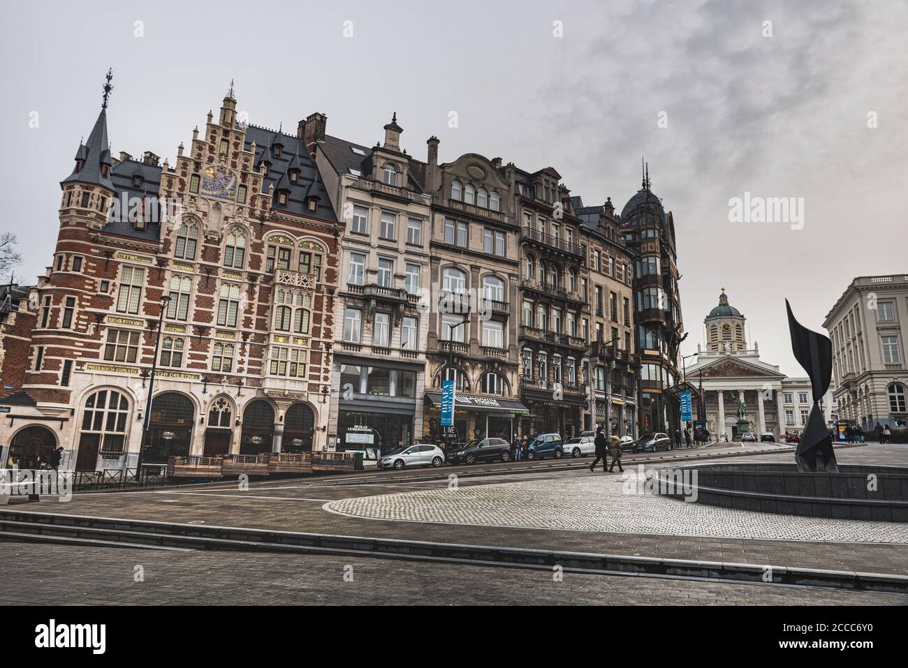 The Whirling Ear monument by Alexander Calder with a row of typical Belgian houses provide a gothic neoclassical architectural glimpse, Brussels Stock Photo