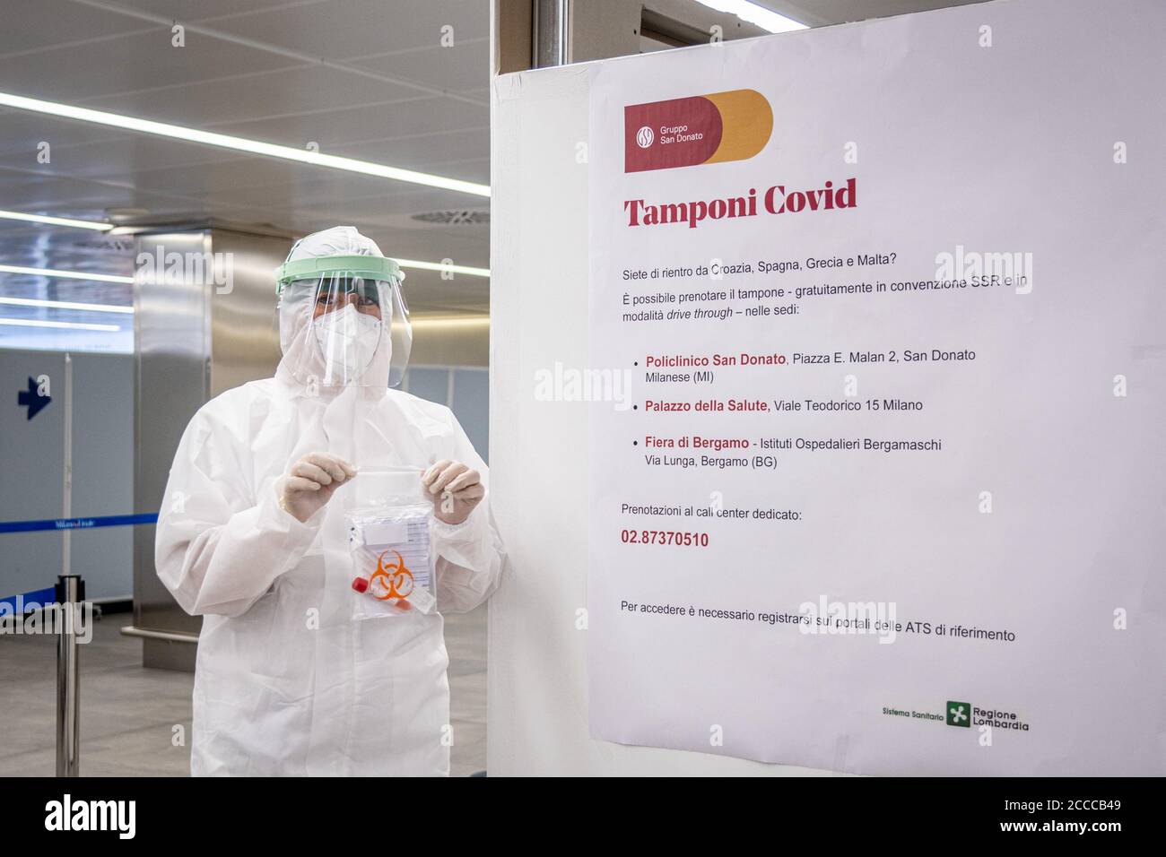 Milan - COVID-19 - First day of Tamponi at Linate Airport for flights  arriving from Croatia, Greece, Malta and Spain. Test area, San Donato  hospital staff with protective suit and PPE Editorial