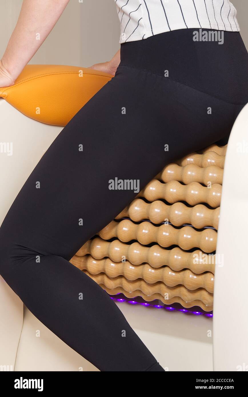 woman making massage for leg fits. Roll Massage machine is a way to shape  the figure. Skin Care, body care concept. modern relax massage equipment  Stock Photo - Alamy