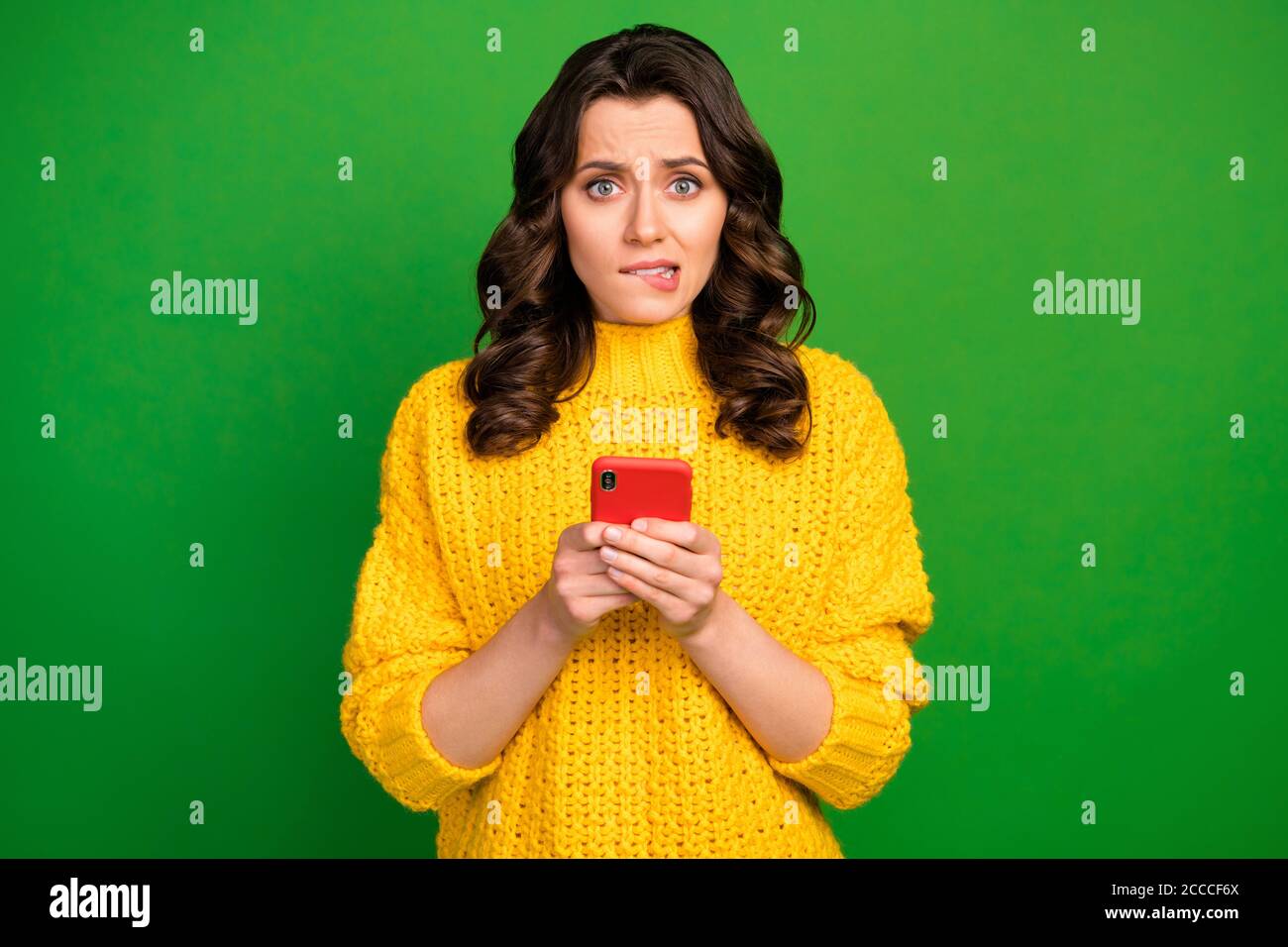 Portrait of frustrated worried girl use smartphone feel anxious panic about  social media blogging notification wear style stylish trendy jumper Stock  Photo - Alamy