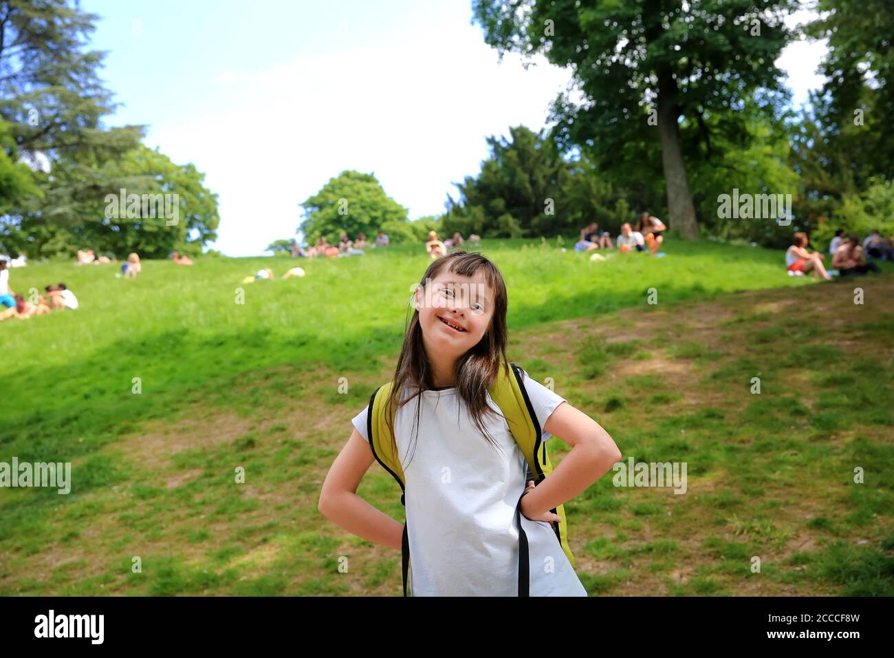 Portrait of little girl smiling in the park Stock Photo - Alamy
