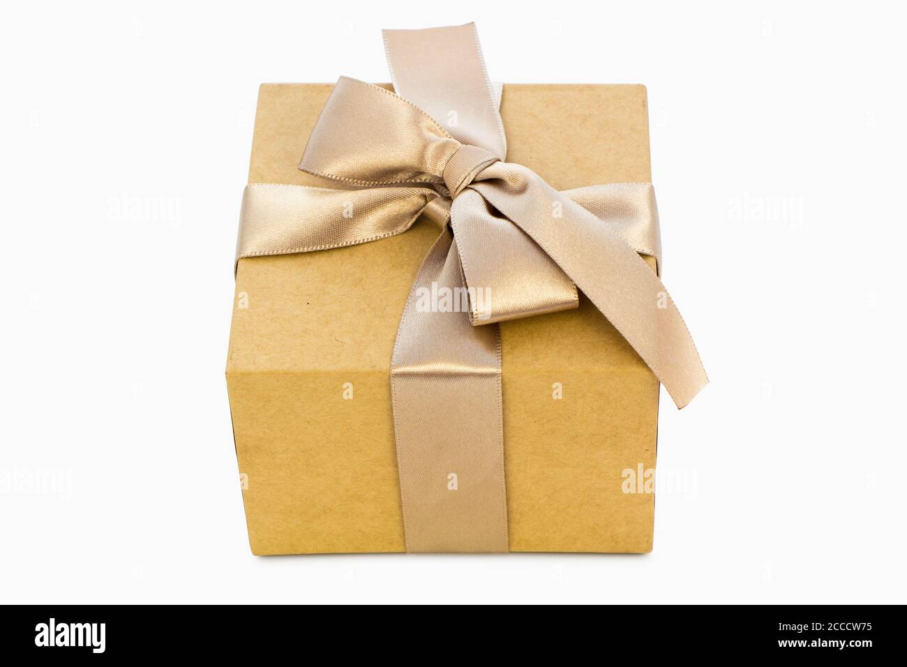 Gift box with golden ribbon isolated on white Stock Photo - Alamy