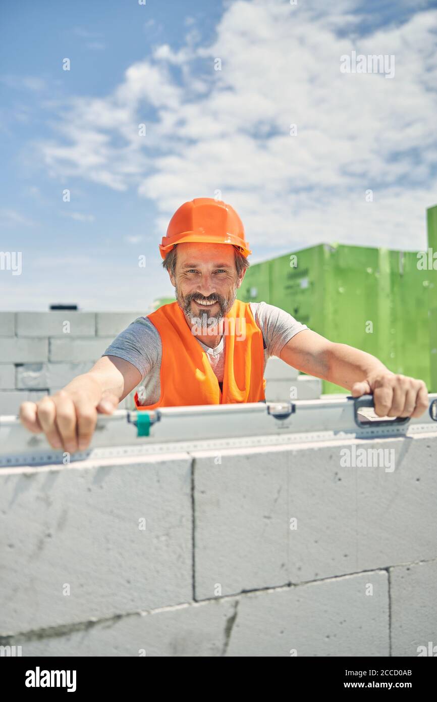 Man spirit level looking hi-res stock photography and images - Alamy