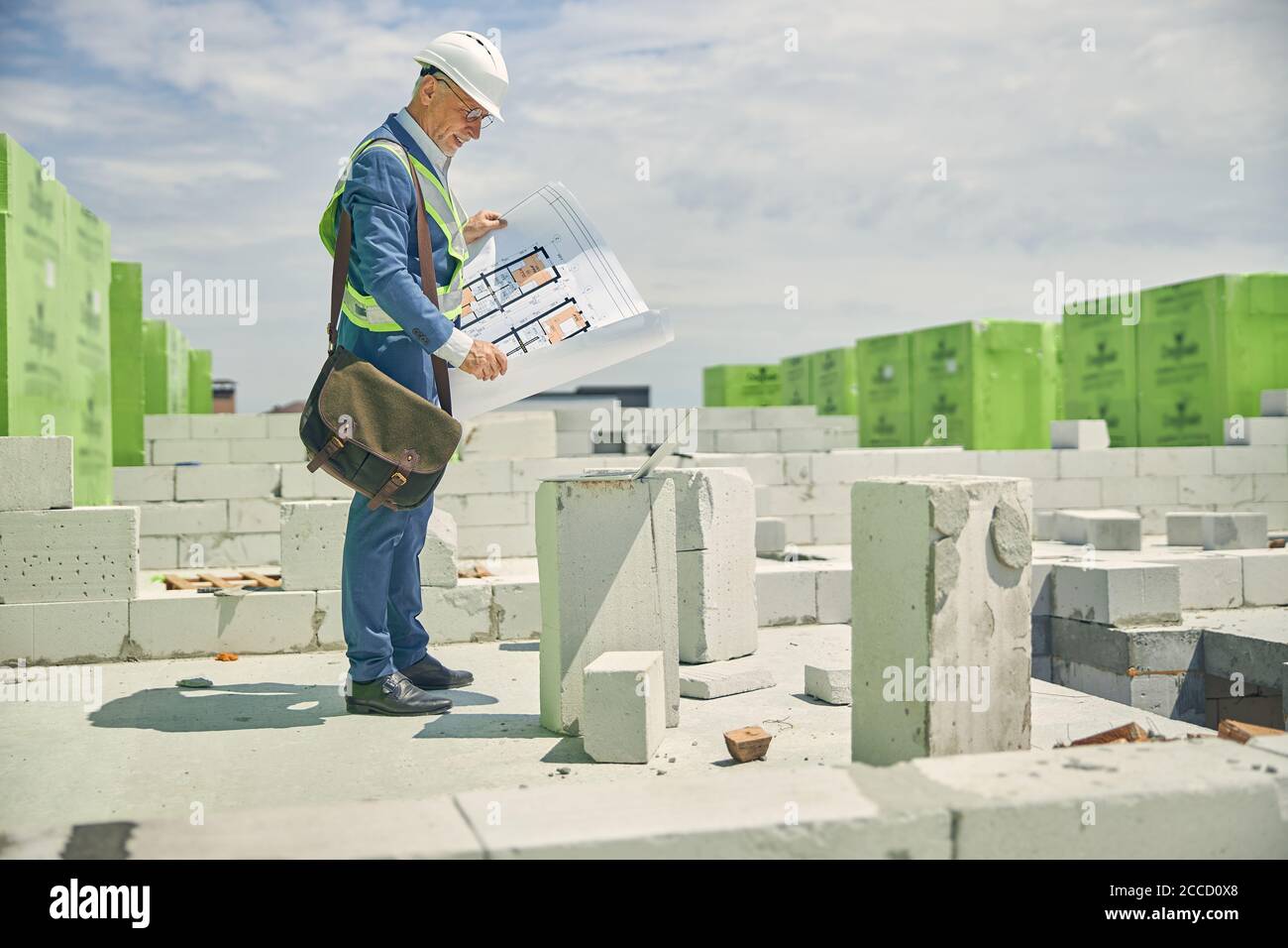 Focused engineer working at a construction site Stock Photo