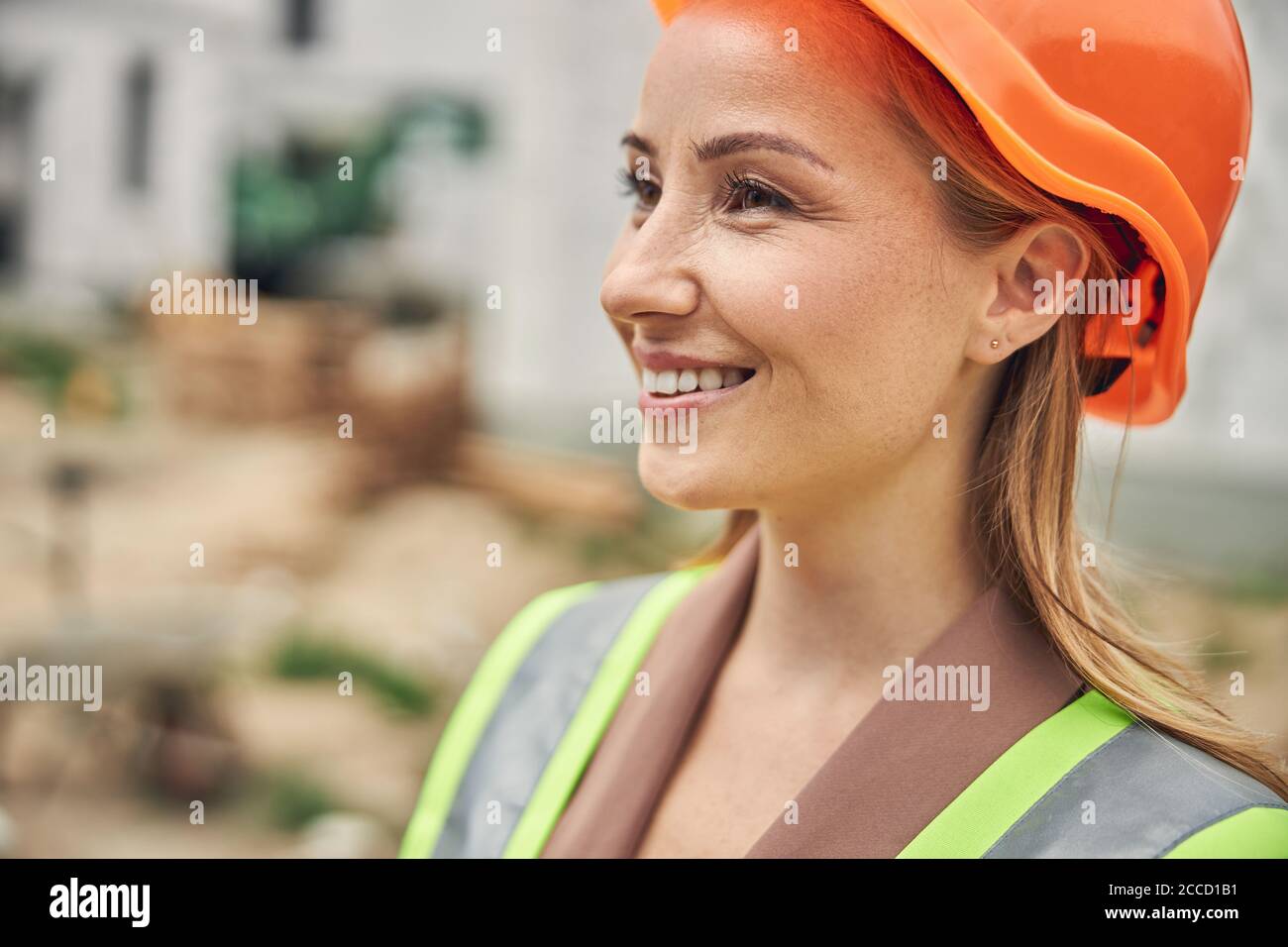 Female civil engineer wearing a hard hat Stock Photo Alamy