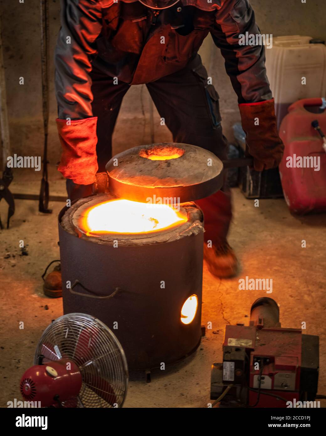 Casting the Bronze in small foundry. Sequence of images shows