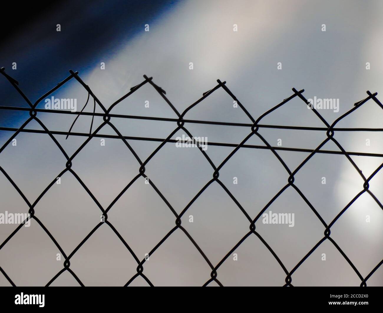 Soft focus of an iron mesh fence with a blurry background Stock Photo ...