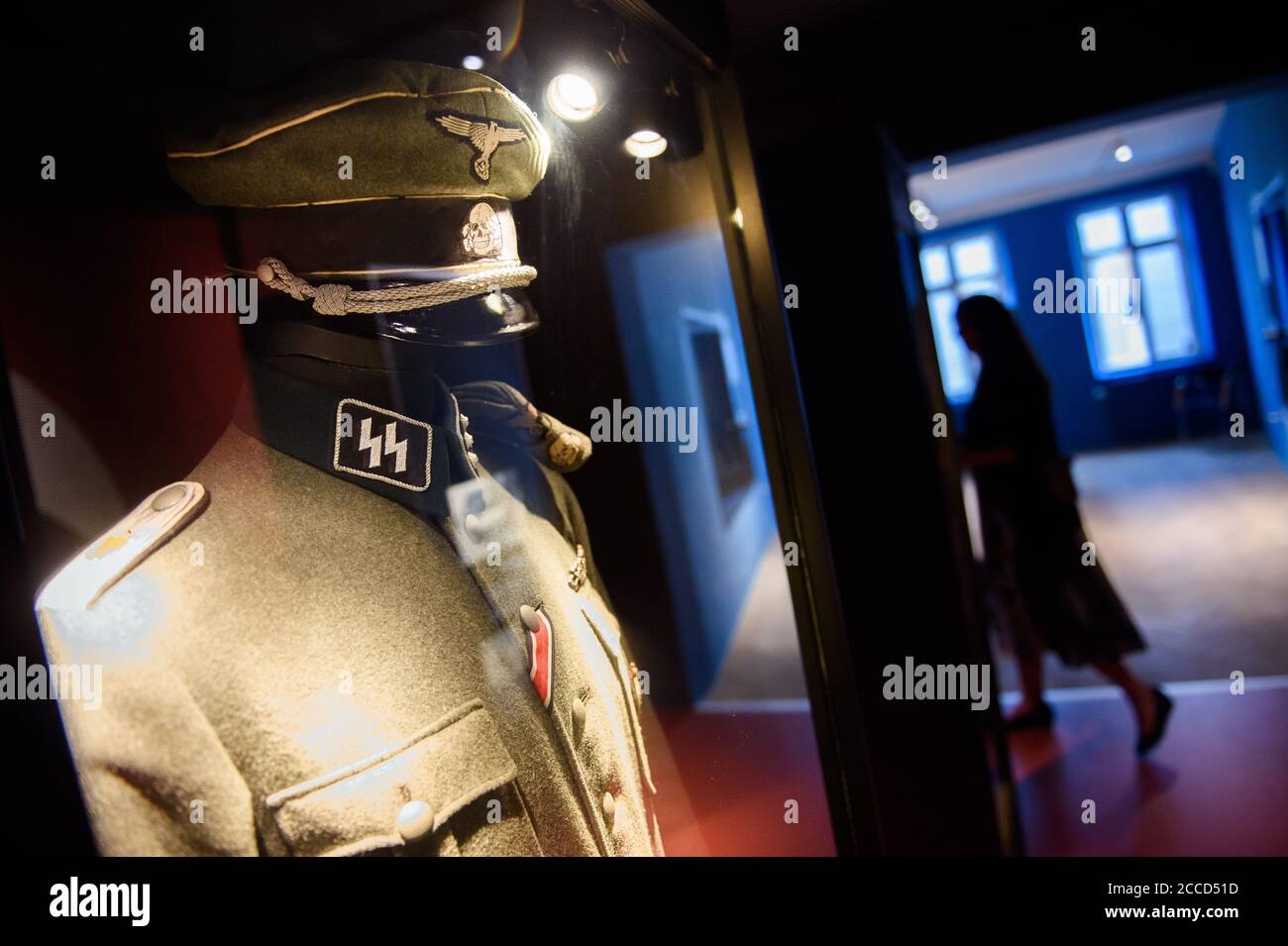 Sonderburg, Denmark. 21st Aug, 2020. A uniform of the Schutzstaffel (SS) of the National Socialists 1925-1945 can be seen in the exhibition on the history of the German population in northern Schleswig in the Deutsches Museum in Sonderburg. Credit: Gregor Fischer/dpa - ATTENTION: Only for editorial use in connection with a report on the exhibition and only with full mention of the above credit/dpa/Alamy Live News Stock Photo