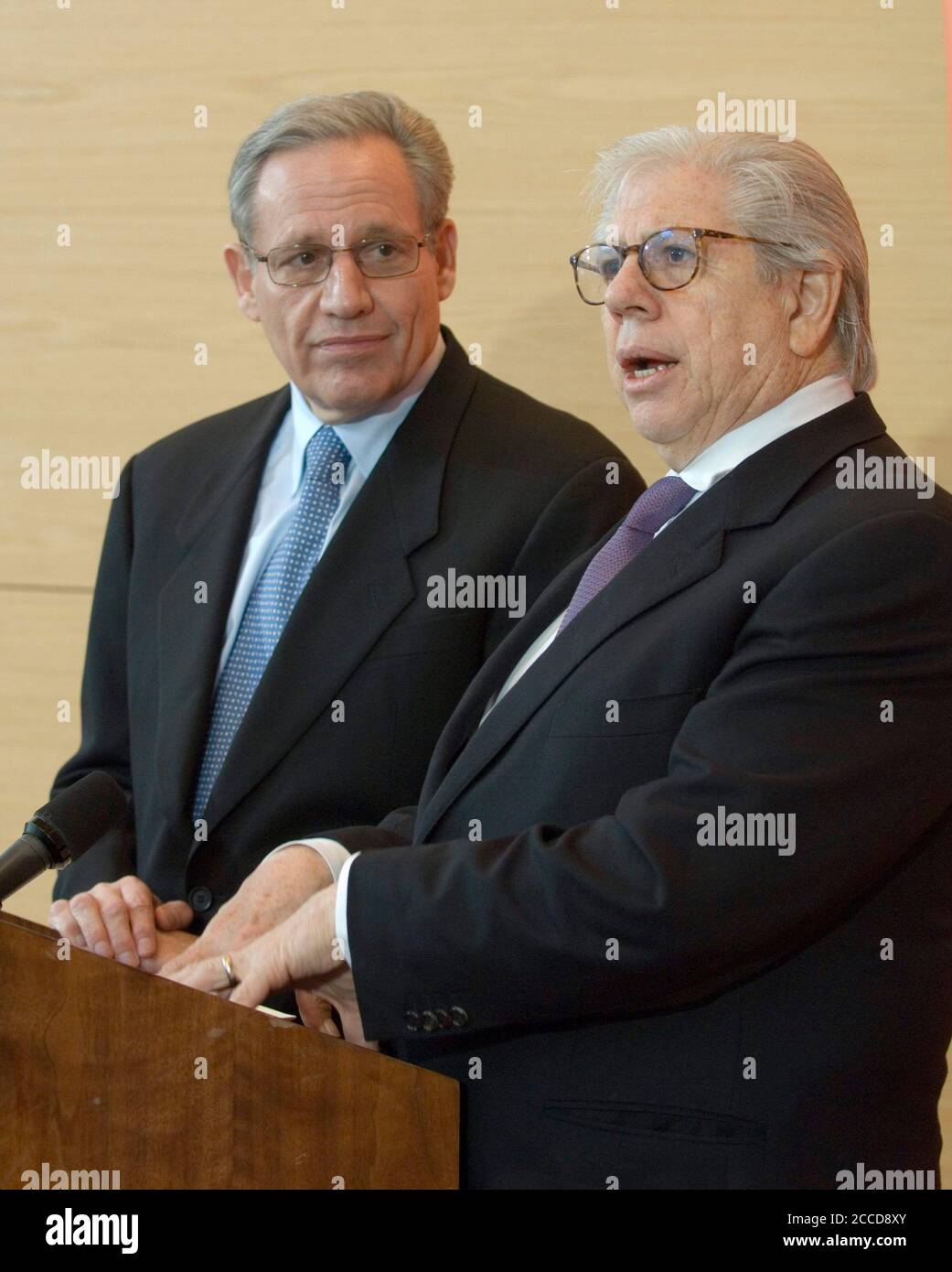 Austin, TX March 23, 2007: Watergate journalists Bob Woodward (l) and Carl Bernstein (r) talk with reporters at the University of Texas where the papers of Mark Felt (aka Deep Throat) were made available to researchers Friday. The pair donated their archives to the Harry Ransom Center in 2006. ©Bob Daemmrich Stock Photo