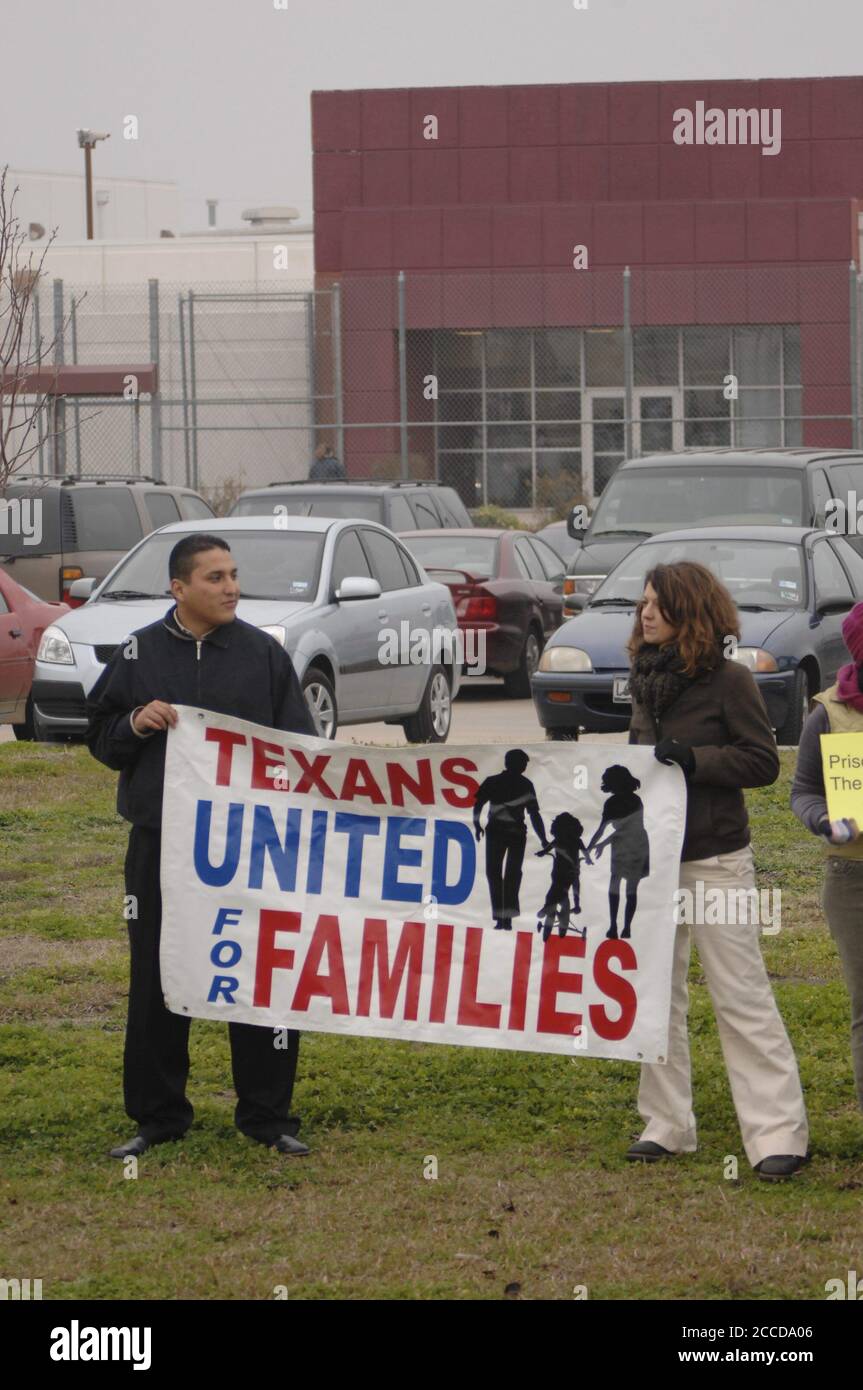 Taylor, TX February 9, 2007: Protesters stand outside the privately-run T. Don Hutto Residential Center, one of only two federal Immigration and Customs Enforcement (ICE) detention facilities for families with children in the U. S. The prison, run by CCA, has come under fire for alleged lack of education for children in the facility. ©Bob Daemmrich Stock Photo