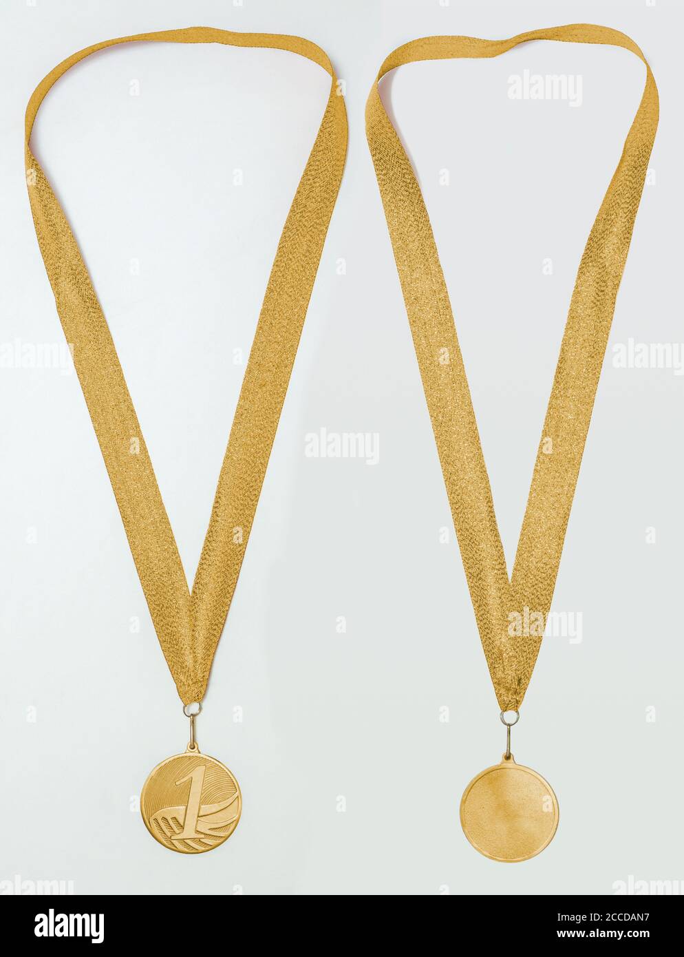 Gold medal with ribbon, two sides, isolated Stock Photo