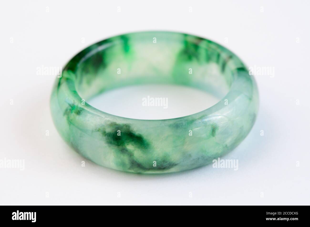 Texture of jadeite ring on white background Stock Photo - Alamy