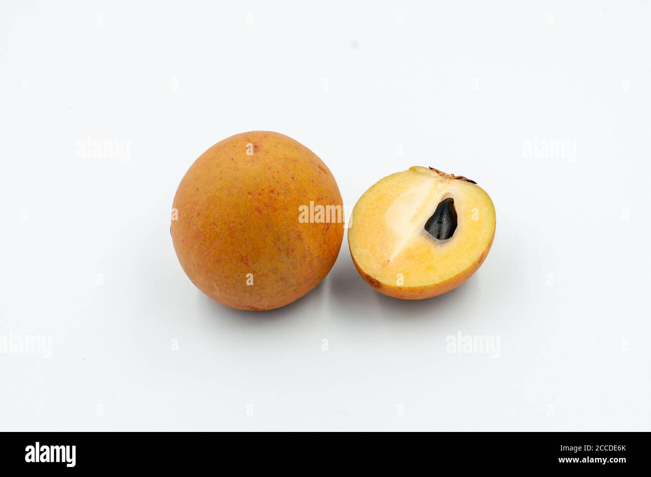 Fresh ripe sweet whole and half tropical Sapodilla fruit isolated on ...