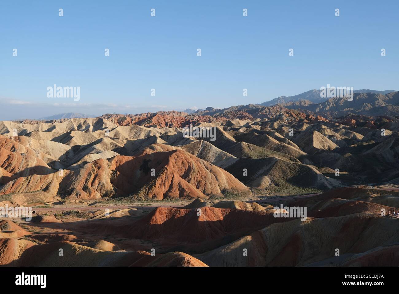 high angle view of colorful Danxia Landform mountain range on sunny day. wide angle. Stock Photo