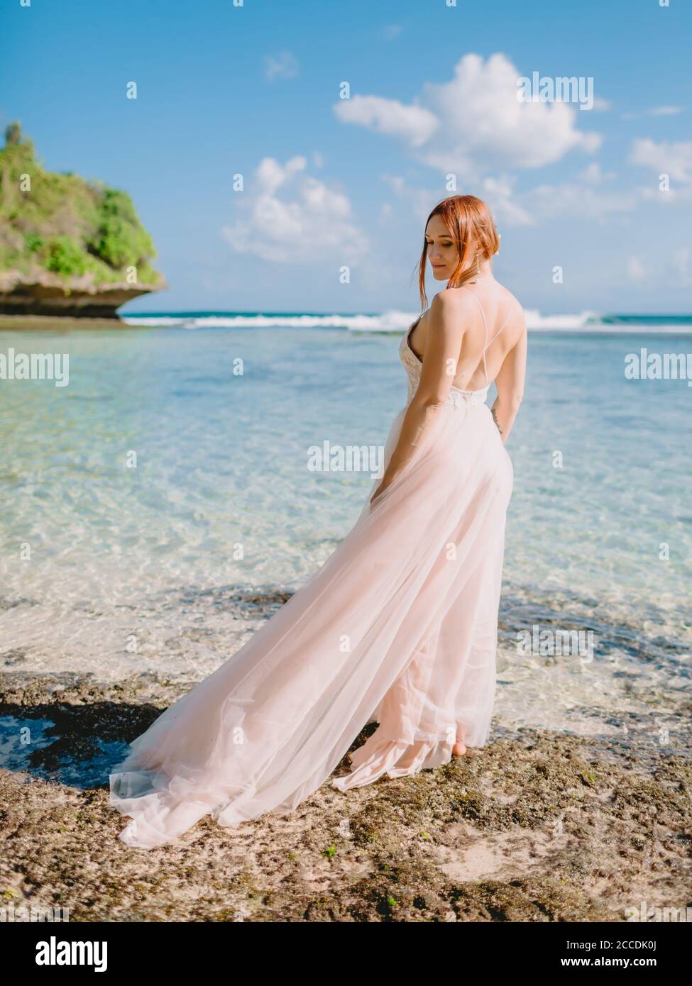 July 5, 2020. Bali, Indonesia. Wedding day of red head bride in wedding  dress at tropical beach. Happy wedding in tropical Bali Stock Photo - Alamy