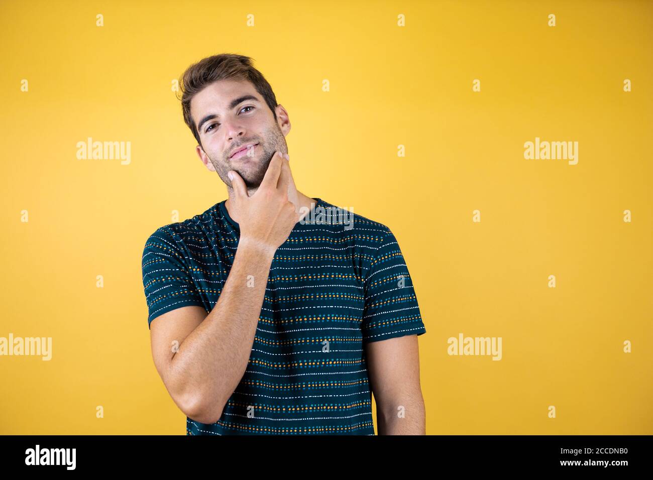 Handsome young man feeling hi-res stock photography and images - Alamy
