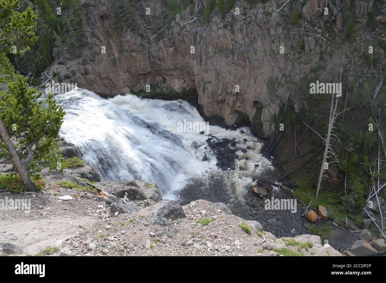 Late Spring in Yellowstone National Park: Overlooking Gibbon Falls on Gibbon River Along the Grand Loop Road Stock Photo