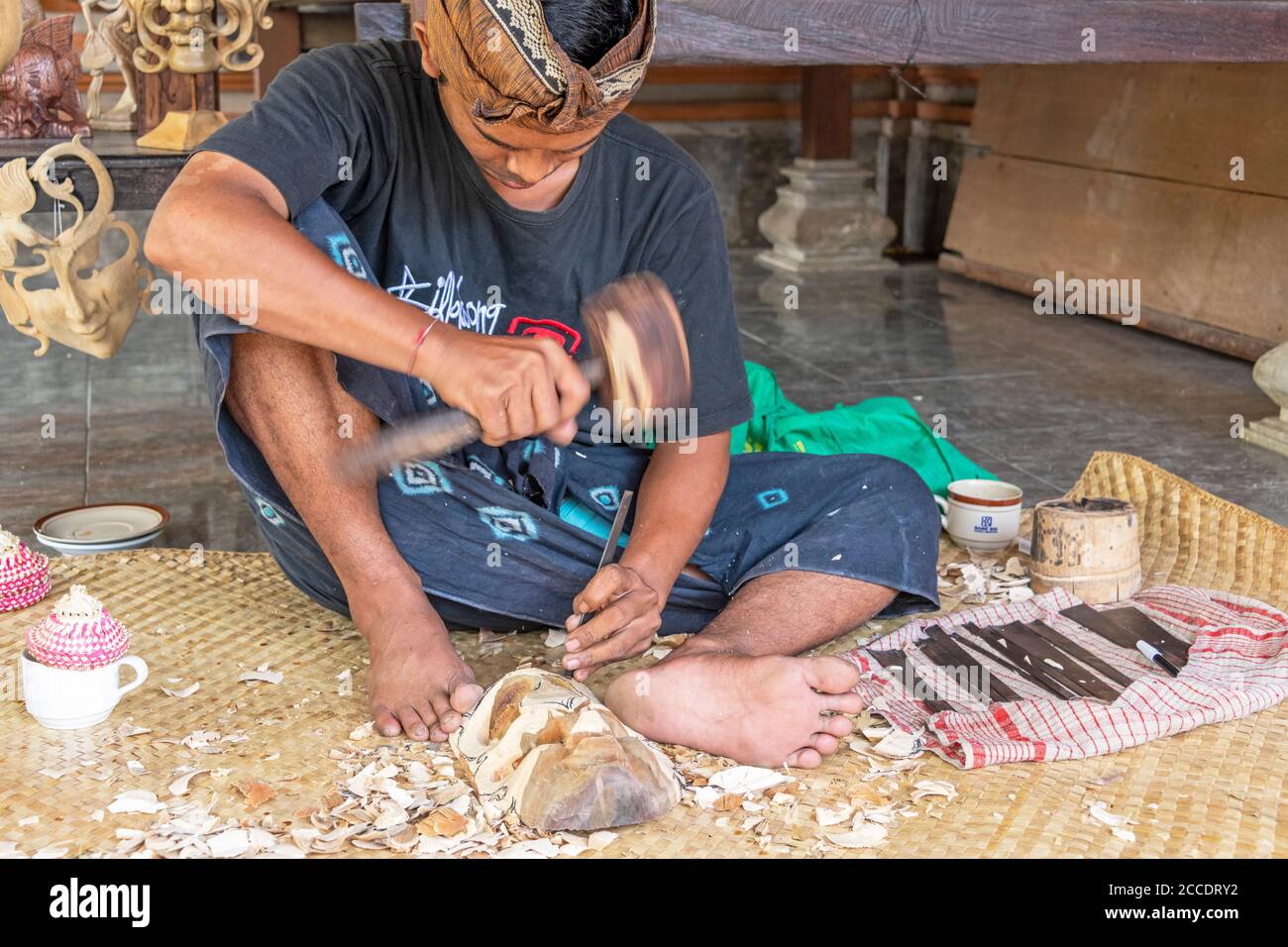 Balinese wood carving is a highly respected, traditional craft and the carvers are extremely talented producing thousands of items for the tourist ind Stock Photo